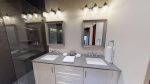 En-suite bathroom with double vanities